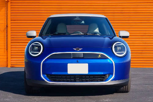 Mini Electric Cooper vs Suzuki Swift | ZigWheels